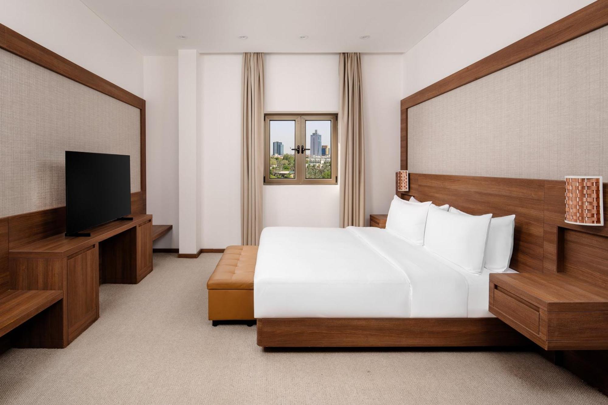 Carlton Al Moaibed Hotel Dammam Exteriér fotografie A bedroom at the hotel