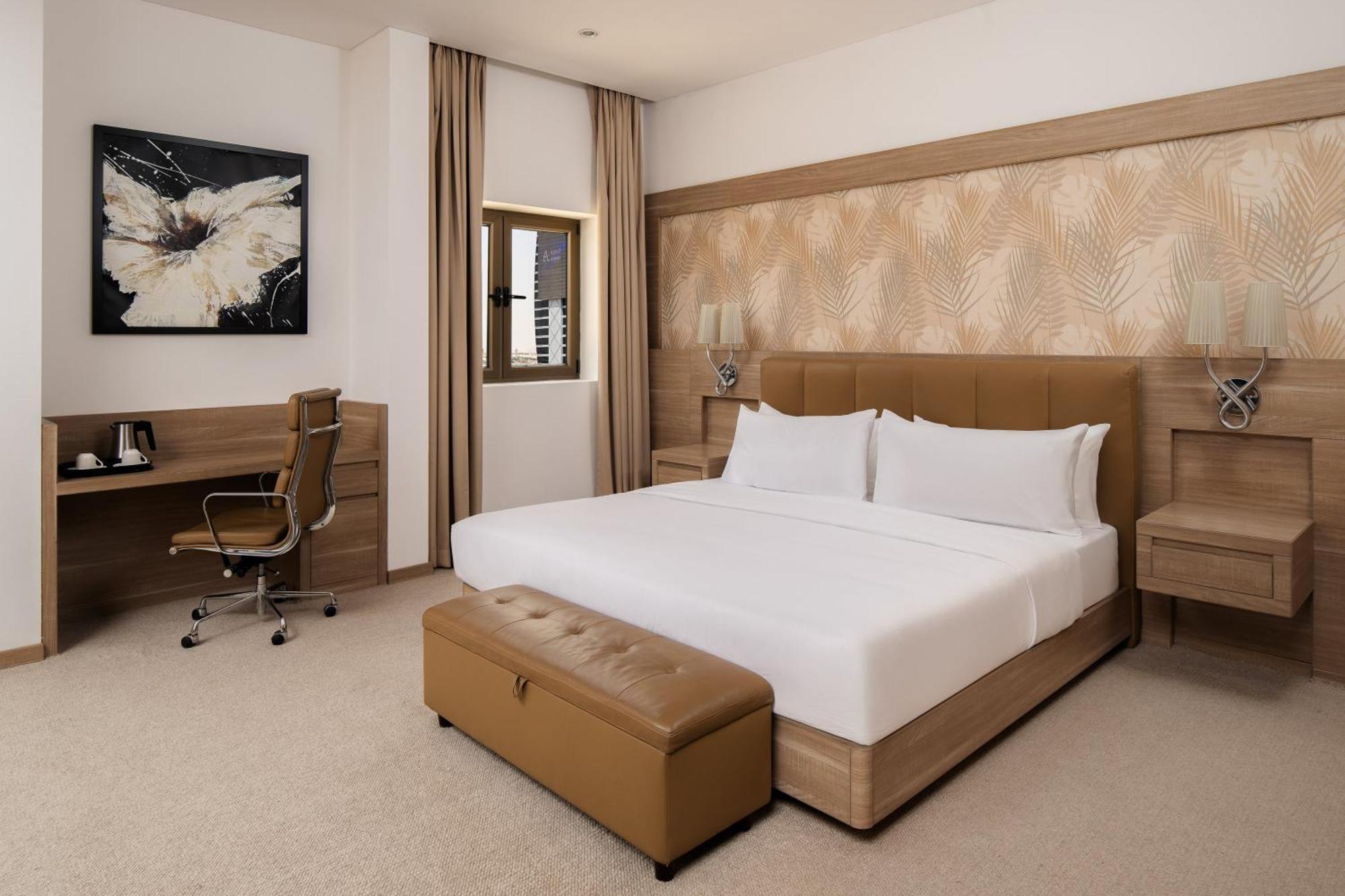 Carlton Al Moaibed Hotel Dammam Exteriér fotografie A bedroom at the hotel